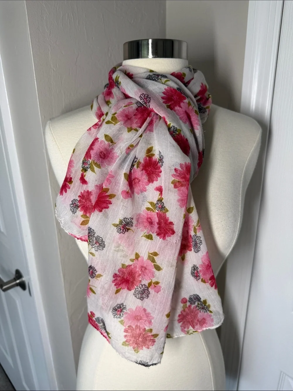 Red and pink daisy floral print scarf on gauzy sheer white background